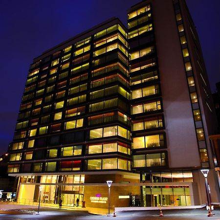 Отель Crowne Plaza Istanbul Harbiye By Ihg Экстерьер фото The hotel at night