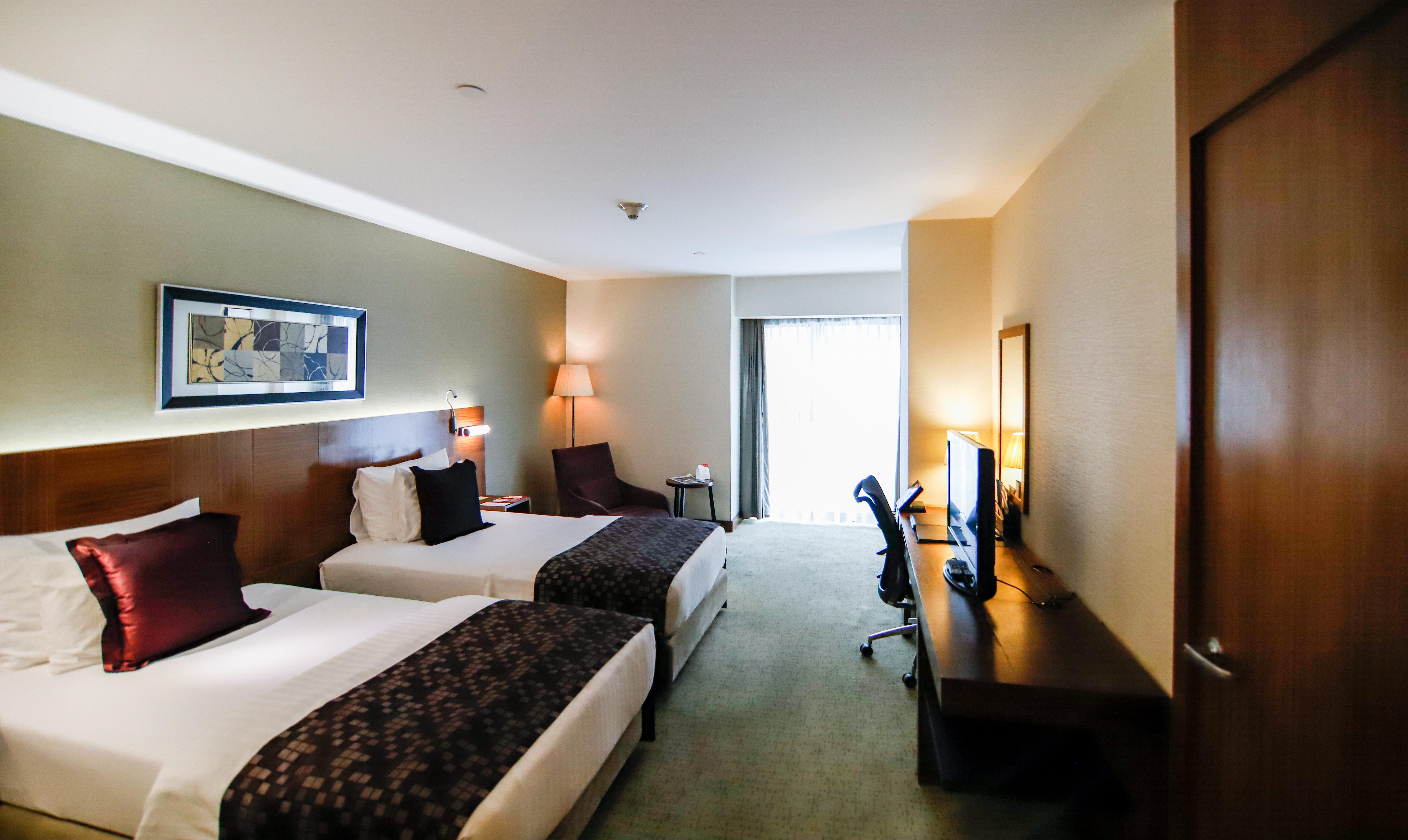 Отель Crowne Plaza Istanbul Harbiye By Ihg Экстерьер фото A room at the hotel